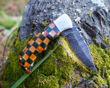 handmade folding damascus knife with impressive handle design
